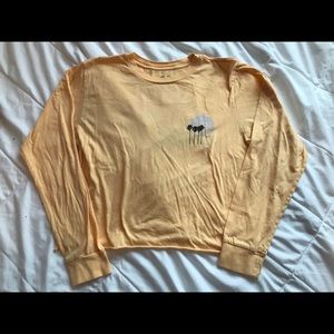 Yellow long sleeve graphic tee